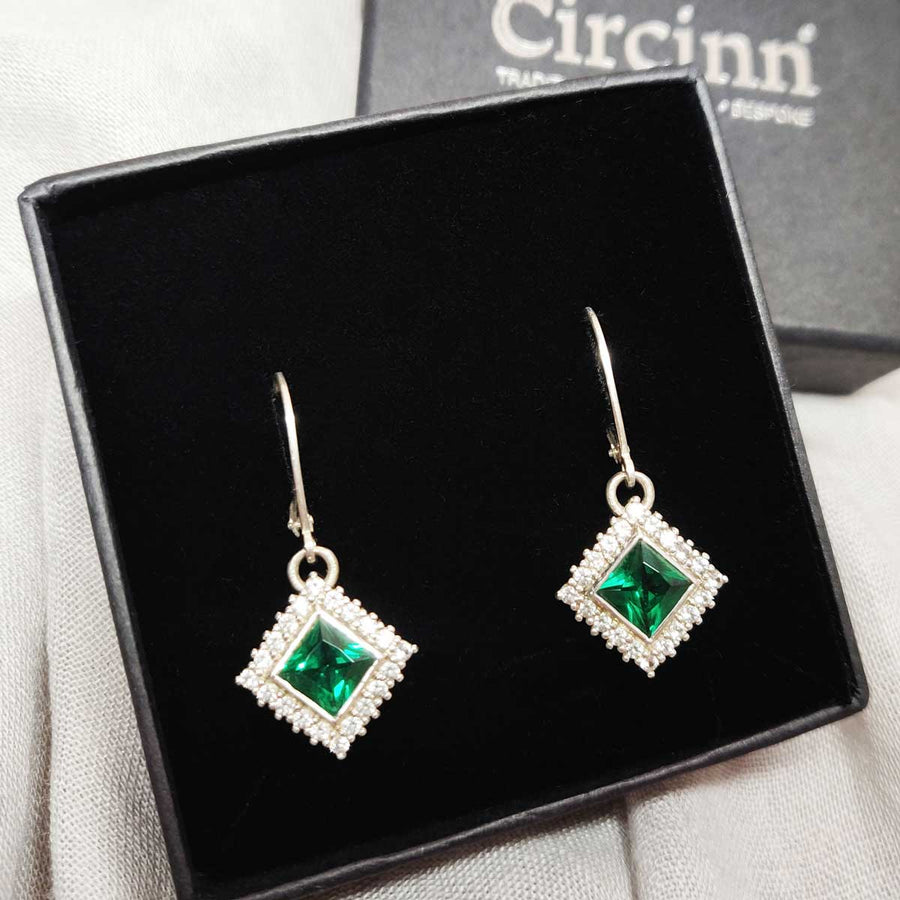 Princess cut emerald and white sapphire cluster earrings in argentium silver in branded box