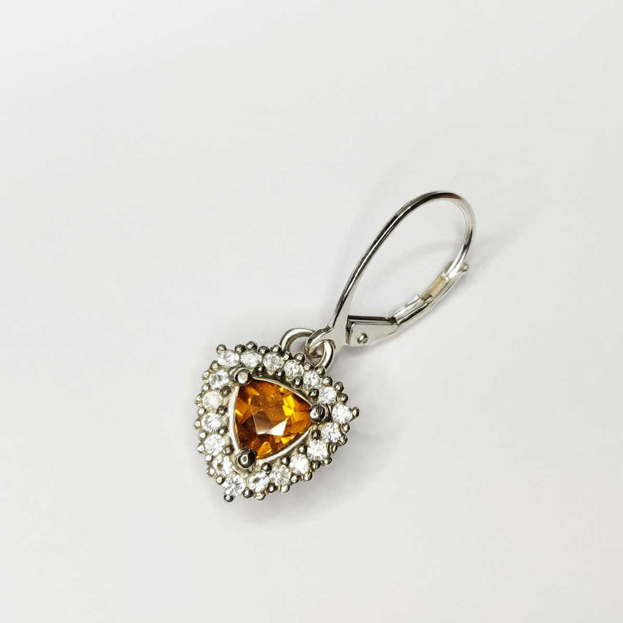 Single Trillion cut citrine and white sapphire cluster earring in argentium silver on white background