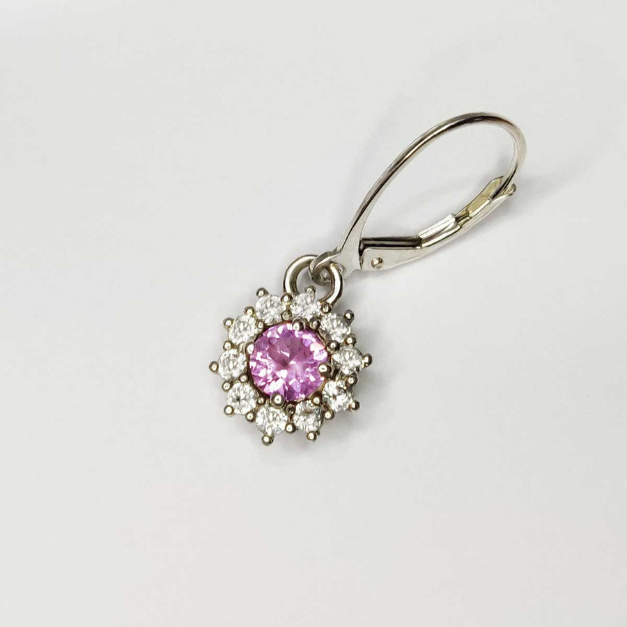 Single pink and white sapphire cluster earring in argentium silver on white background