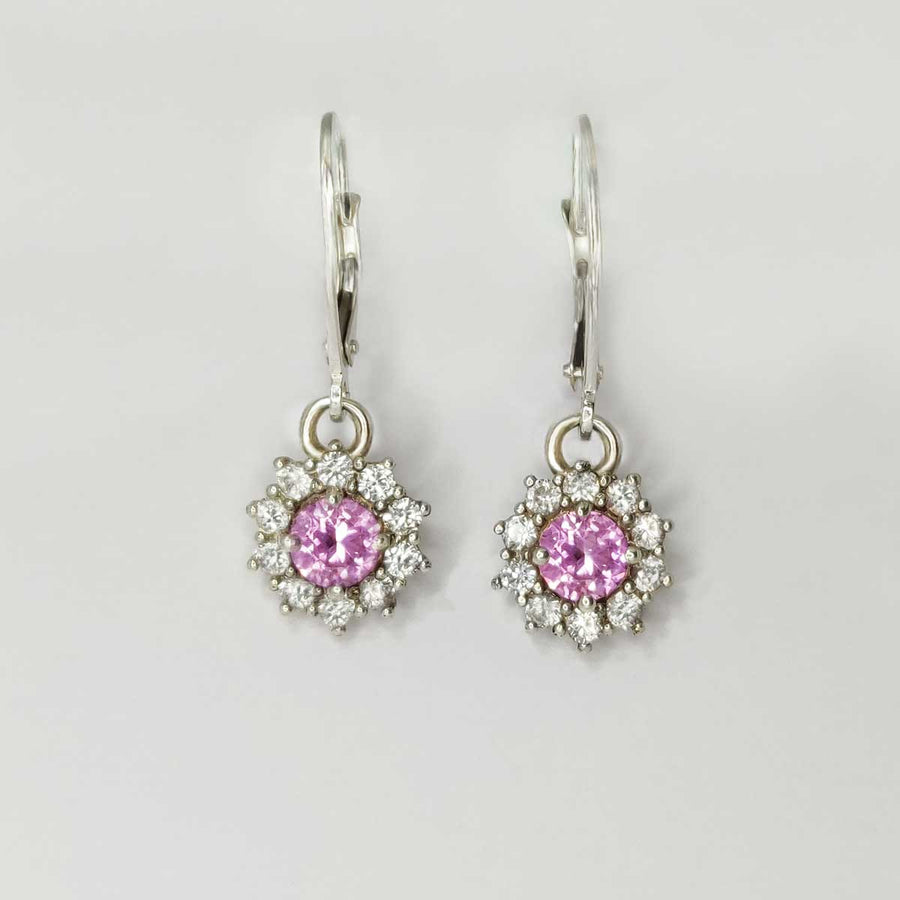 Pink and white sapphire cluster earrings in argentium silver on white background