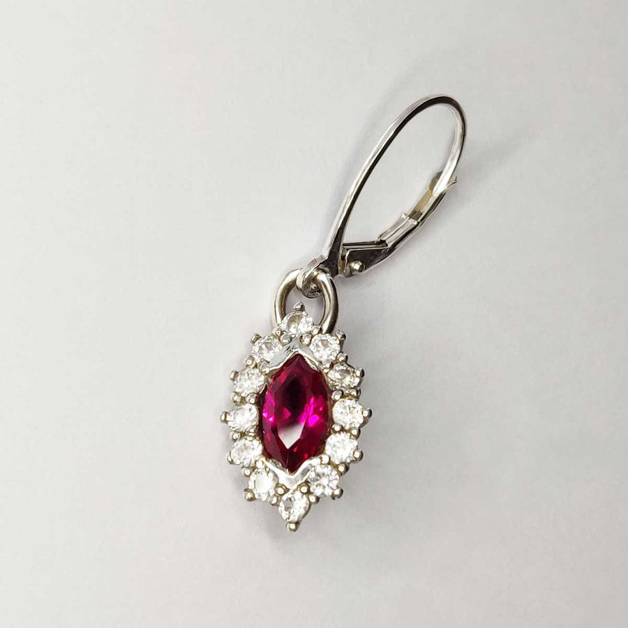 Single Ruby Marquise and white sapphire cluster earring in argentium silver on white background