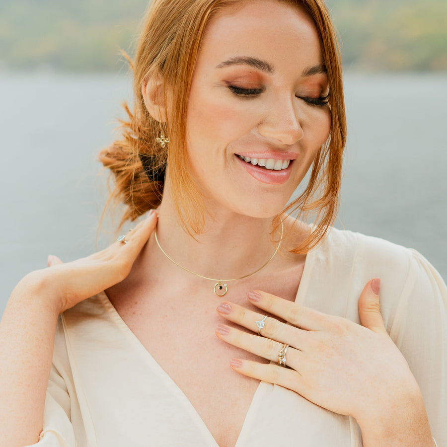 Pretty Girl Wearing A Solasta Omega Diamond and Sapphire Gold Necklace