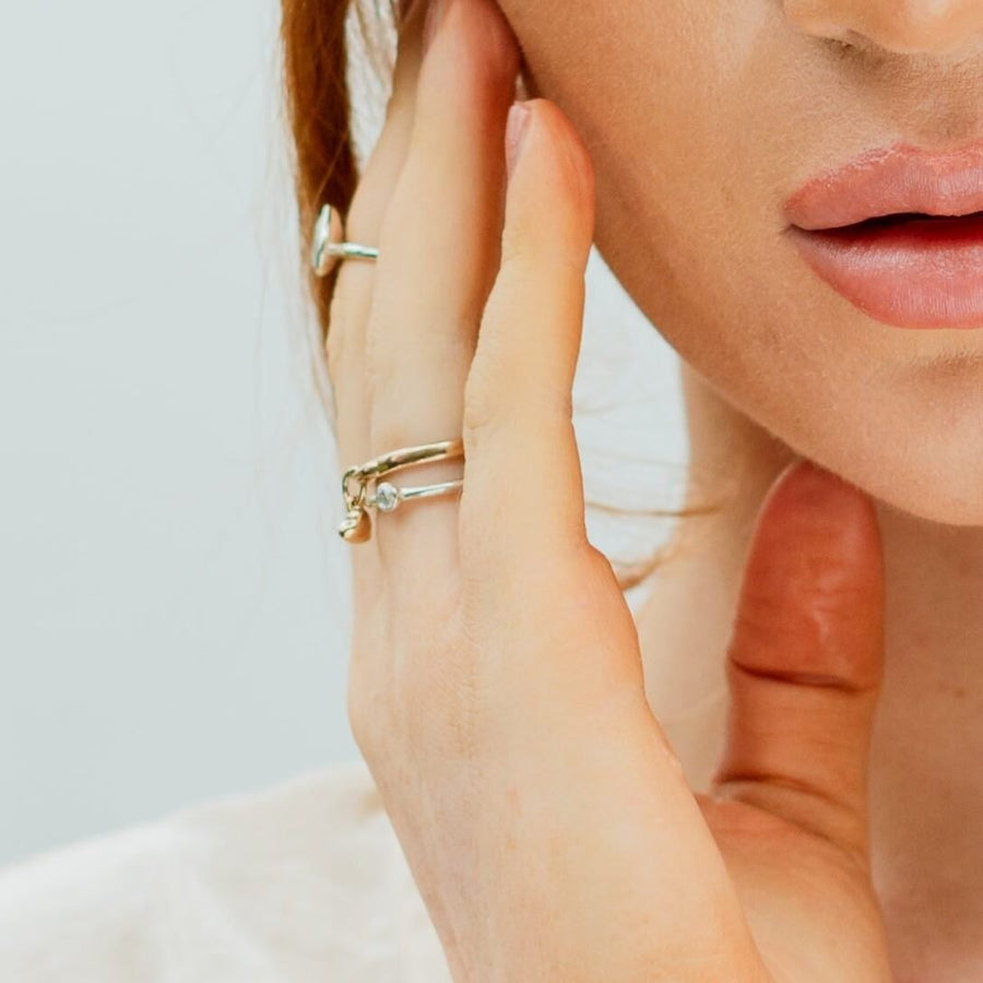 Model Wearing Solid Gold Heart Drop Ring