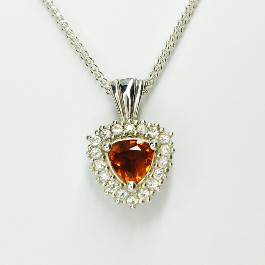 Citrine and Sapphire Cluster Necklace on a white background.