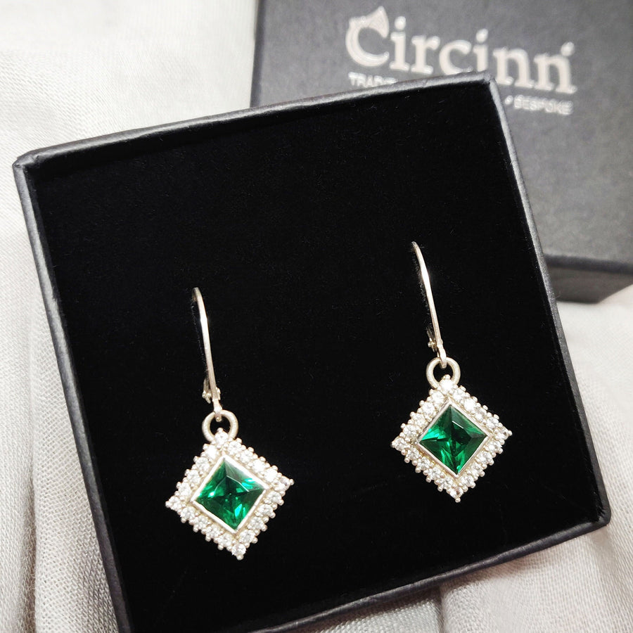 Princess Cut Emerald and Diamond Cluster Earrings in a display box