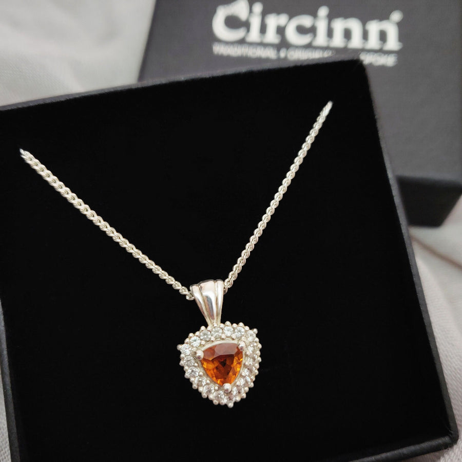 Argentium Sterling Silver Citrine and Sapphire Cluster Necklace in a presentation box.
