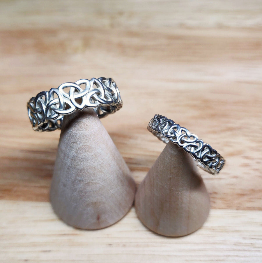 Gents Triquetra Celtic Knot Viking Wedding Ring on Wooden Cones
