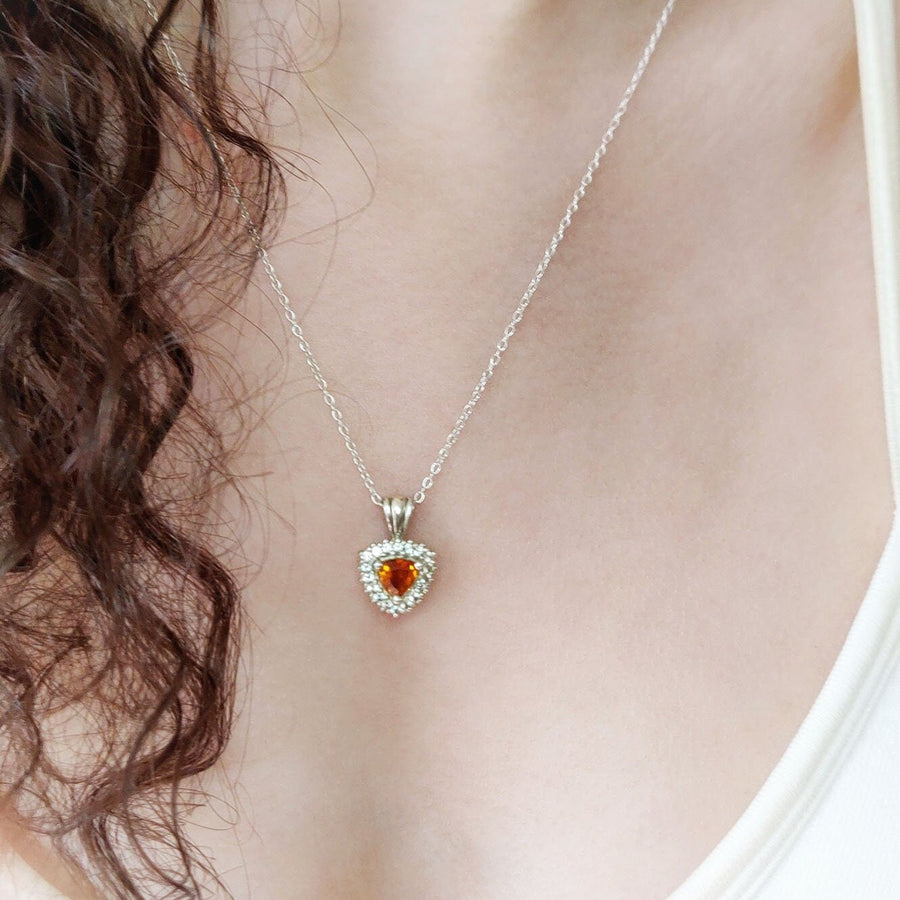 Citrine and Sapphire Cluster Pendant being worn.