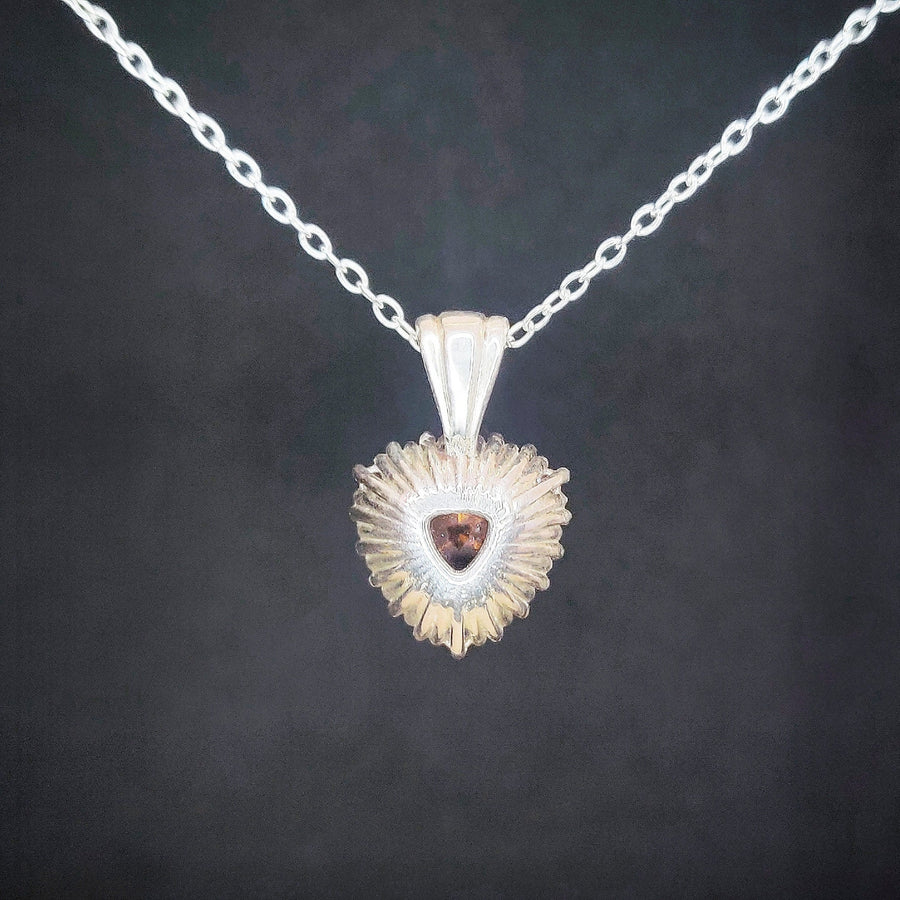 Citrine and Sapphire Cluster Necklace seen from the rear on a black background