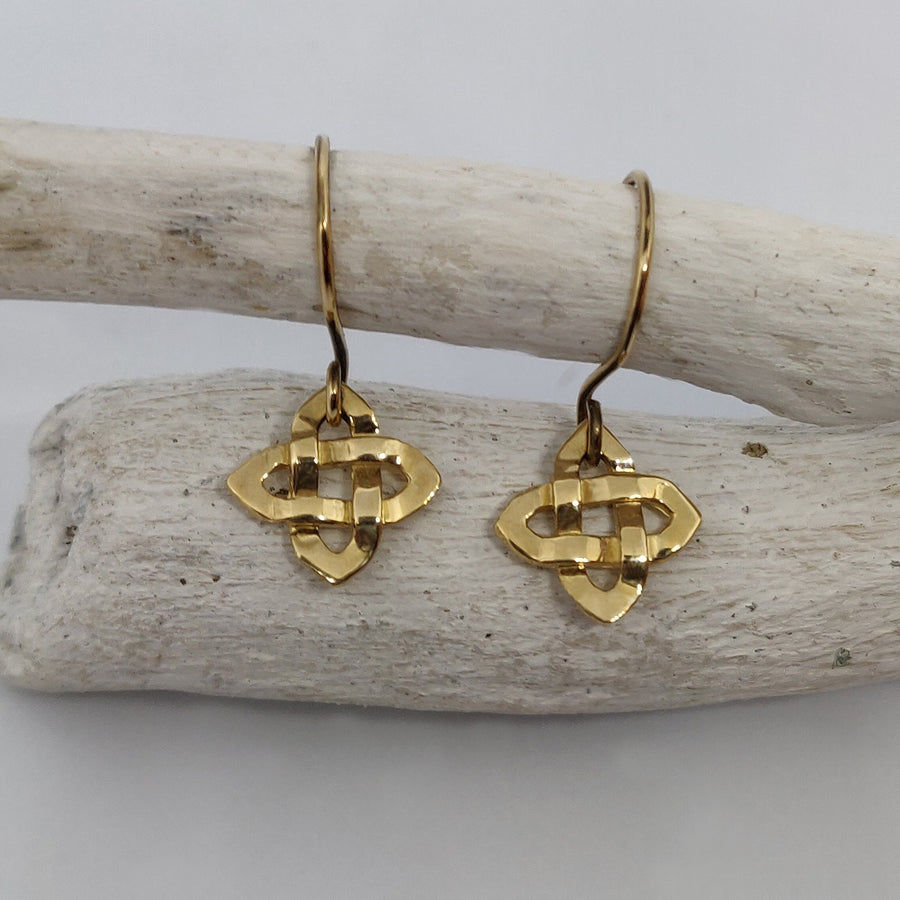 14k solid gold celtic cross knot earrings on a white background.