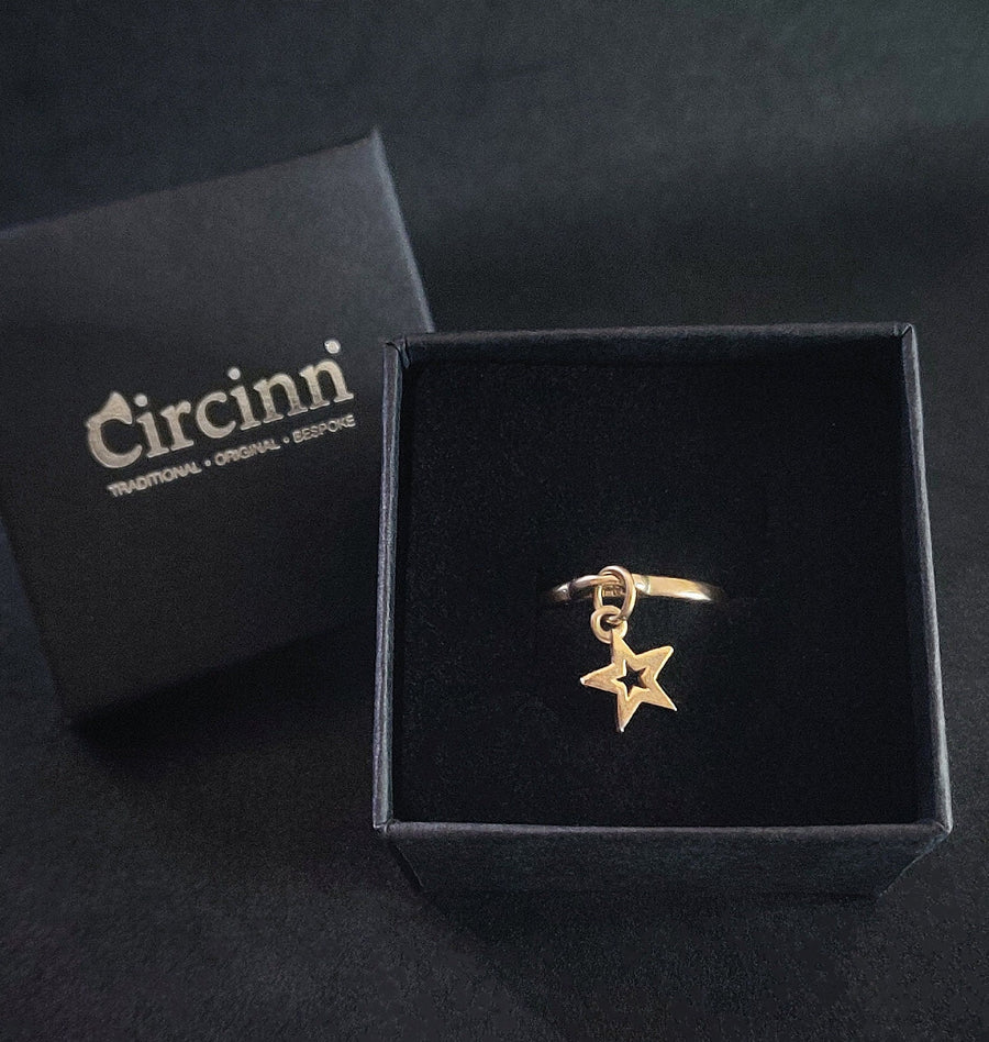 Solid Gold Star Charm Ring in a Circinn Branded Box.