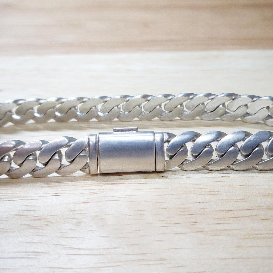 close up of a man&#39;s cuban curb style bracelet