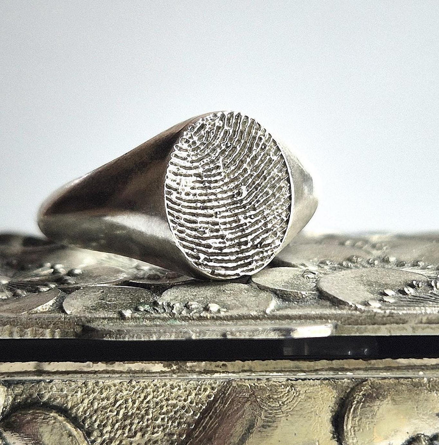 Argentium Silver Fingerprint Ring on a box