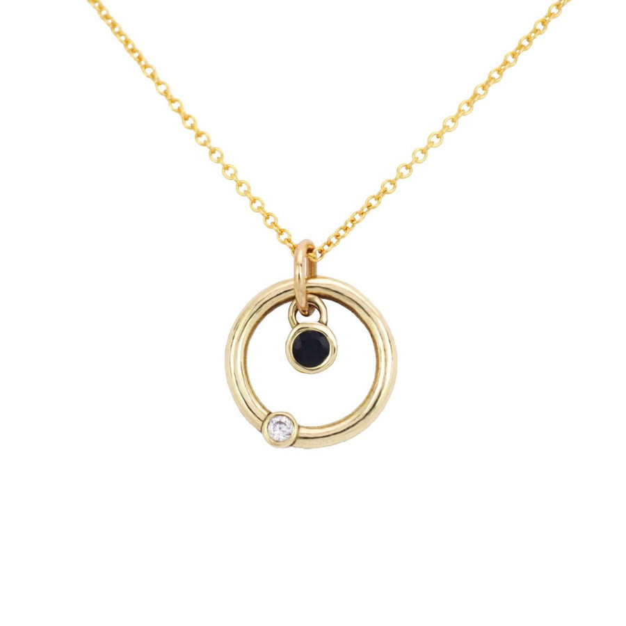 Solasta diamond and sapphire round gold necklace and chain on white background