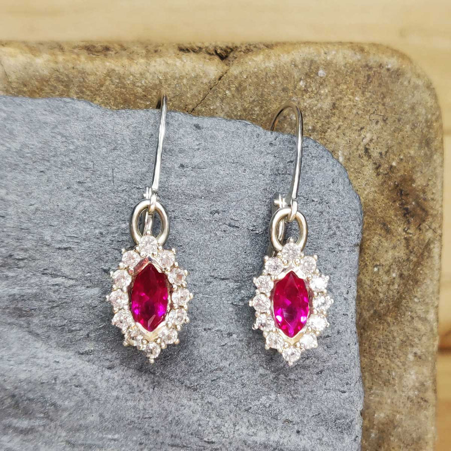 Ruby Marquise and white sapphire cluster earrings in argentium silver on slate background