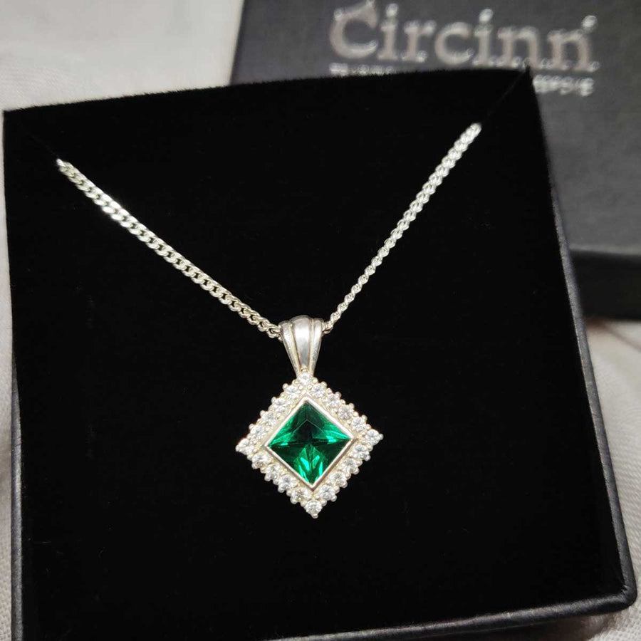 Princess cut emerald and white sapphire cluster necklace in argentium silver in branded box