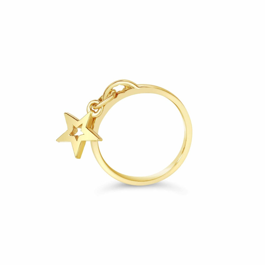 Gold drop ring with a star charm on a white background
