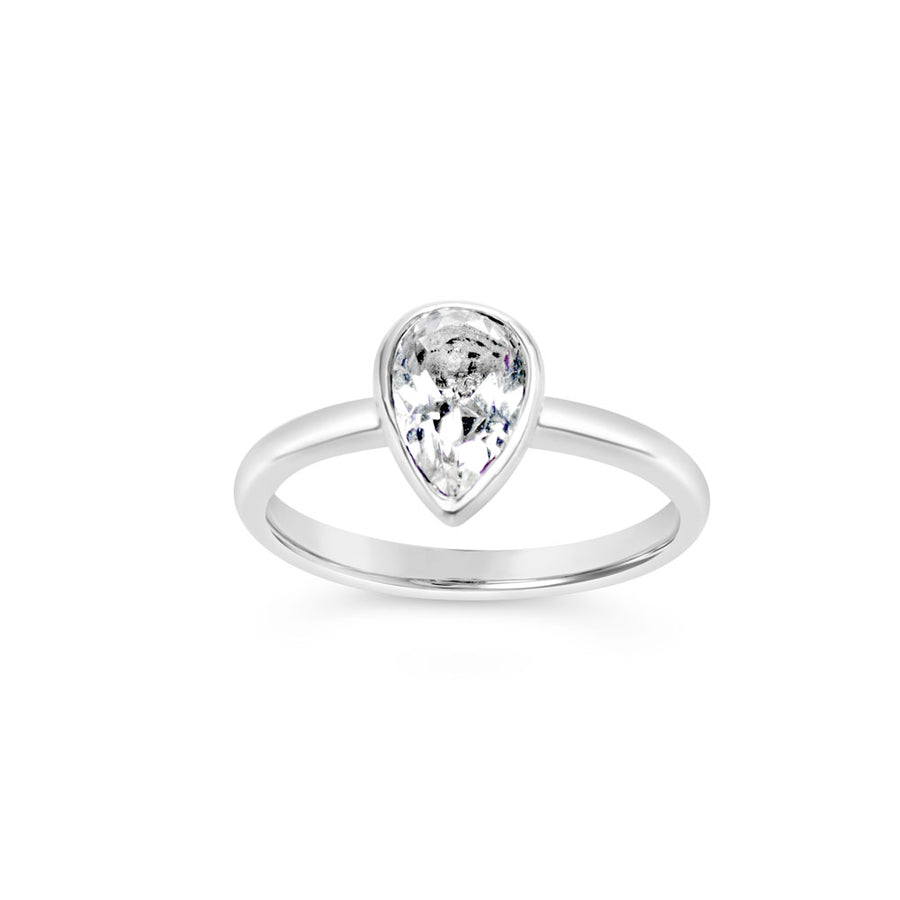 White pear cut topaz ring in argentium silver on white background