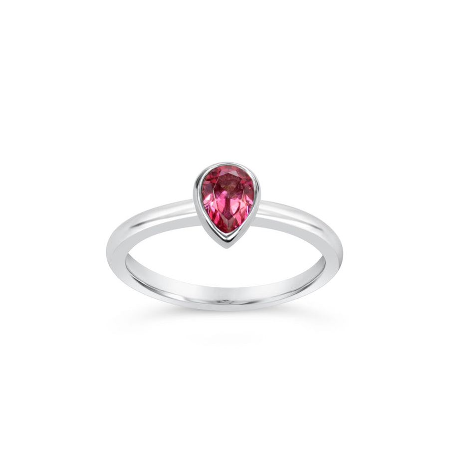 Small pear cut pink topaz argentium silver ring on white background