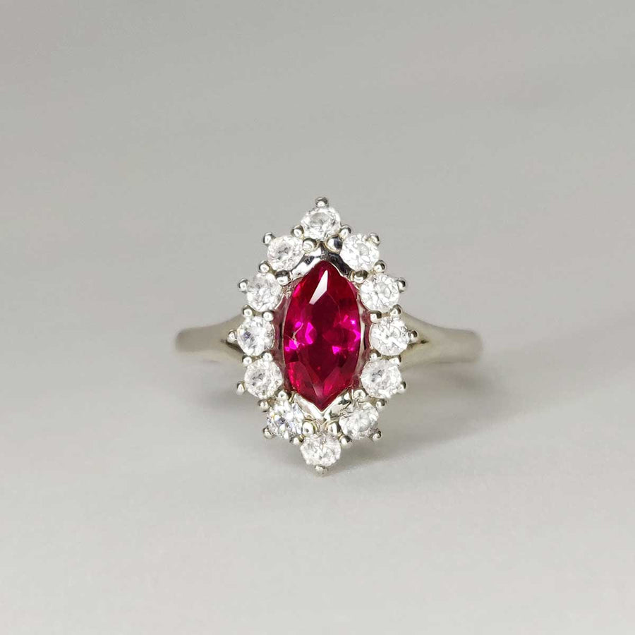 Ruby Marquise and white sapphire cluster ring in argentium silver on white background